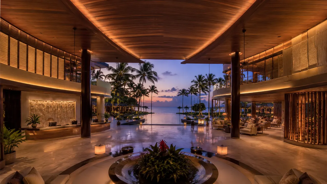 360 degree virtual tour of a hotel guest room showing the bed, seating area, desk and window with the resort grounds beyond