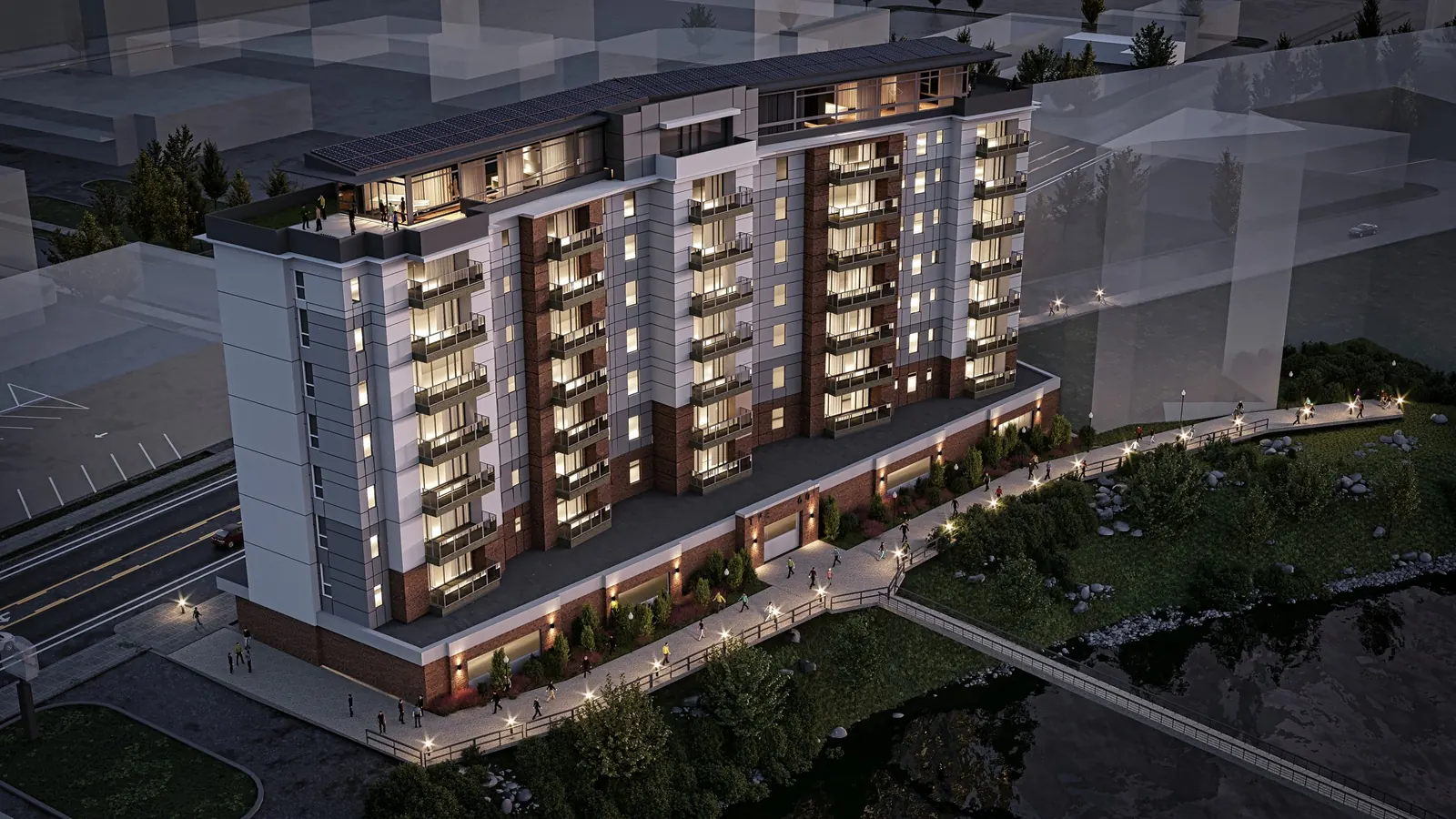 Aerial night rendering of a midrise apartment community
