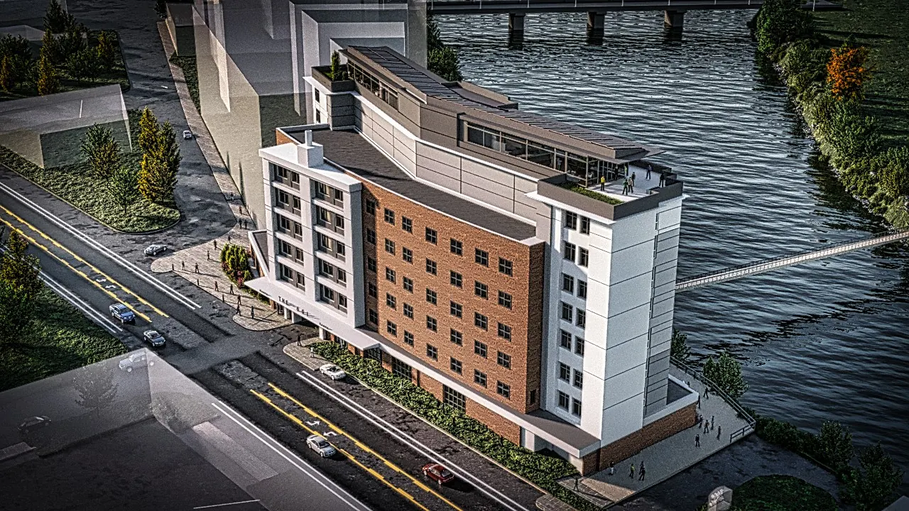 Aerial rendering of a riverfront midrise development